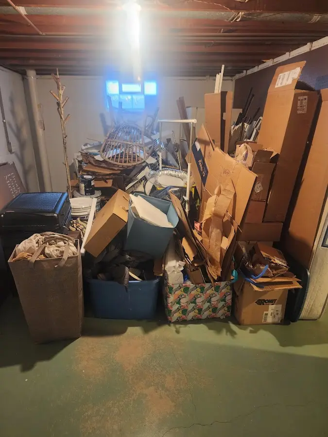 Roll-off dumpster container at job site for 15 Yard Dumpster Rental in Lady Lake